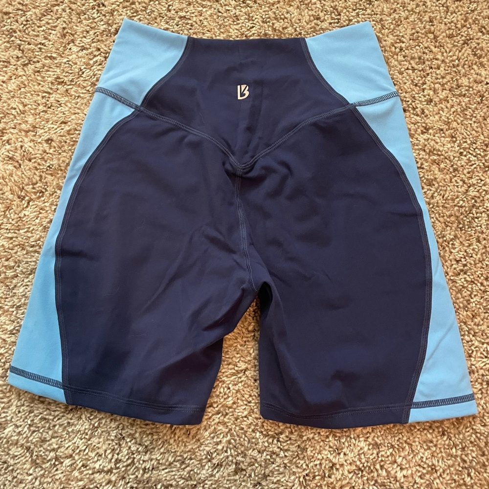 Never worn, only tried on! Buffbunny 6” shorts color block blue, size M